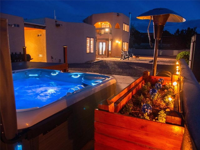 7 Paseo De Rincon, Santa Fe, NM 87508 - pool at twilight with a hot tub