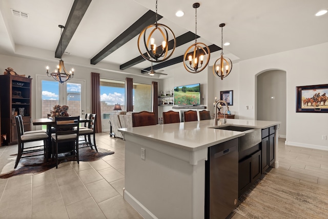 6816 Cleary Loop NE, Rio Rancho, NM 87144 - kitchen with a chandelier, stainless steel dishwasher, arched walkways, light countertops, and a kitchen island with sink