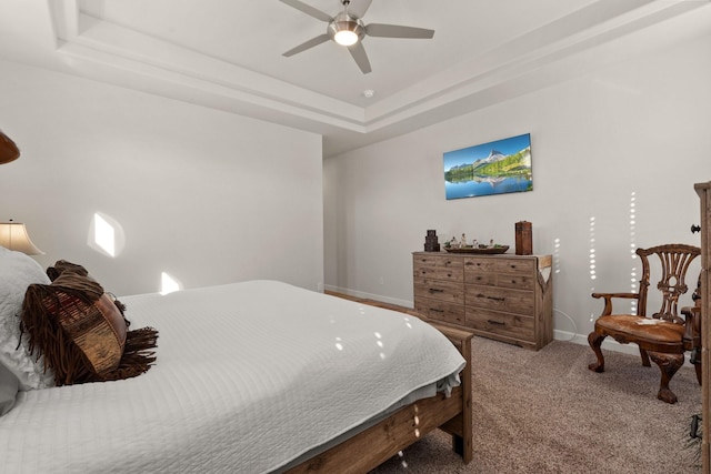 6816 Cleary Loop NE, Rio Rancho, NM 87144 - bedroom with carpet flooring, a tray ceiling, and a ceiling fan