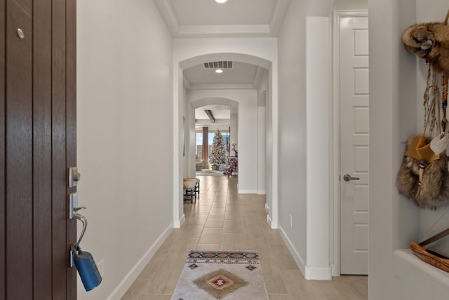 6816 Cleary Loop NE, Rio Rancho, NM 87144 - foyer featuring arched walkways, light tile patterned floors, crown molding, and recessed lighting