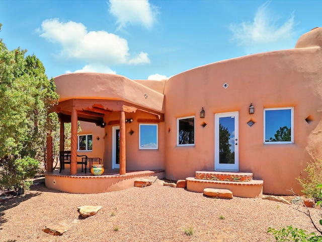 31AB Hondo Trl, Santa Fe, NM 87508 - rear view of house featuring stucco siding