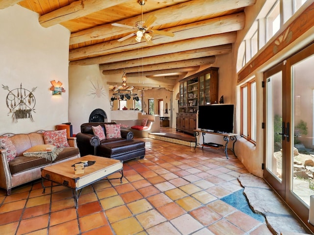 31AB Hondo Trl, Santa Fe, NM 87508 - living room featuring a wooden ceiling with exposed beams, healthy amount of natural light, ceiling fan, and light tile patterned floors
