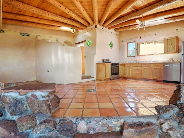 31AB Hondo Trl, Santa Fe, NM 87508 - kitchen featuring appliances with stainless steel finishes, a wooden ceiling with exposed beams, light tile patterned floors, and light countertops