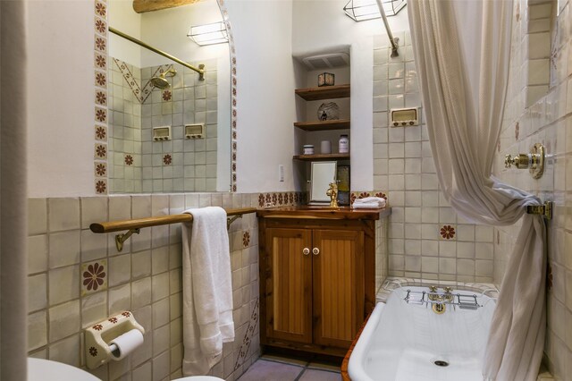 576 Camino Del Monte Sol, Santa Fe, NM 87505 - full bathroom featuring tile walls, tiled shower, vanity, tile patterned floors, and a tub to relax in