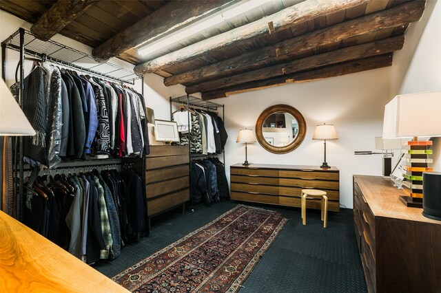 576 Camino Del Monte Sol, Santa Fe, NM 87505 - spacious closet with dark colored carpet and beamed ceiling