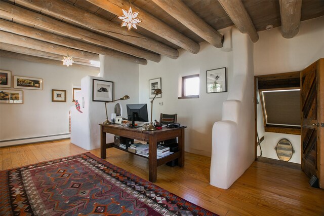 576 Camino Del Monte Sol, Santa Fe, NM 87505 - office space featuring a baseboard radiator, light wood-style flooring, and a wood ceiling with exposed beams