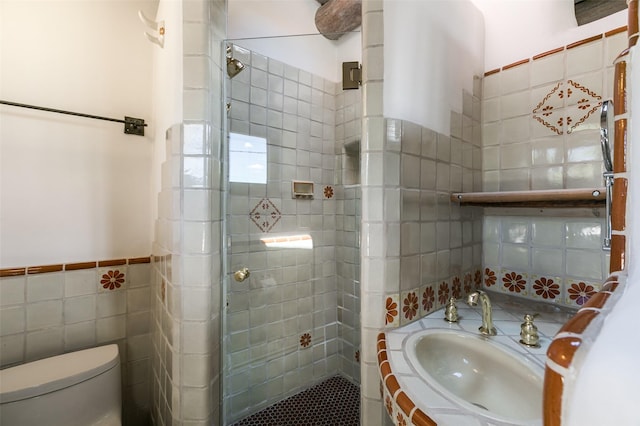576 Camino Del Monte Sol, Santa Fe, NM 87505 - bathroom with tile walls, a shower stall, and vanity