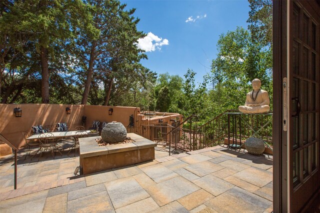576 Camino Del Monte Sol, Santa Fe, NM 87505 - view of patio / terrace with outdoor dining space