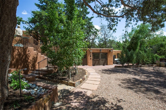 576 Camino Del Monte Sol, Santa Fe, NM 87505 - back of property with stucco siding