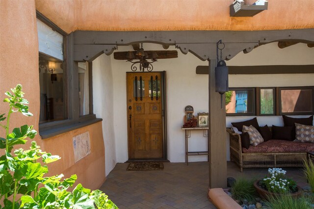 576 Camino Del Monte Sol, Santa Fe, NM 87505 - doorway to property with a ceiling fan