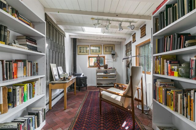 576 Camino Del Monte Sol, Santa Fe, NM 87505 - office space with brick flooring, a wood ceiling with exposed beams, and a skylight