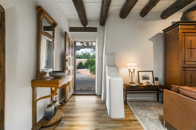 576 Camino Del Monte Sol, Santa Fe, NM 87505 - entrance foyer featuring light wood finished floors and beamed ceiling