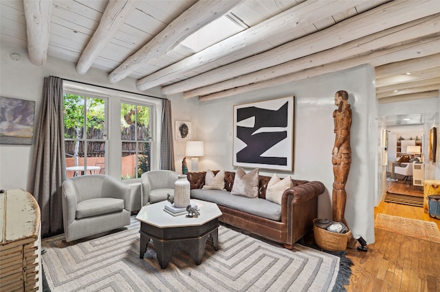 507 Acequia Madre, Santa Fe, NM 87505 - living room featuring hardwood / wood-style flooring and a wooden ceiling with exposed beams