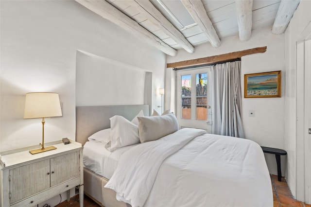 507 Acequia Madre, Santa Fe, NM 87505 - bedroom with a wood ceiling with exposed beams