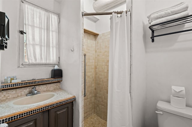 507 Acequia Madre, Santa Fe, NM 87505 - bathroom featuring a stall shower, vanity, and decorative backsplash