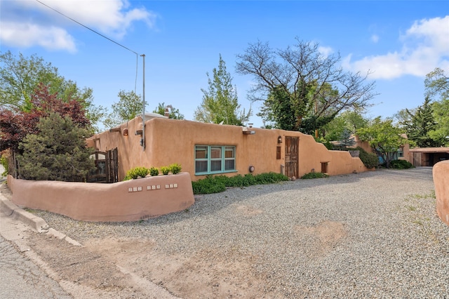 507 Acequia Madre, Santa Fe, NM 87505 - view of front of home featuring stucco siding
