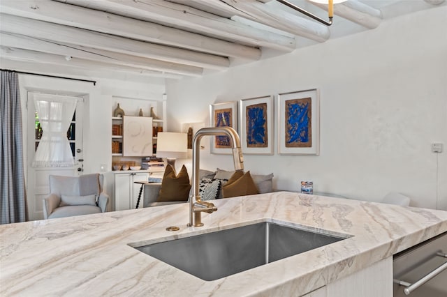 507 Acequia Madre, Santa Fe, NM 87505 - kitchen with beam ceiling, light stone countertops, and dishwasher