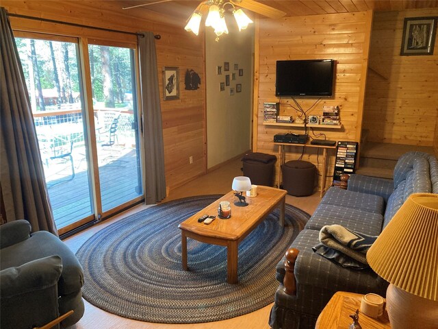 9 Bear Rd, Chama, NM 87520 - living area with wooden walls and a ceiling fan
