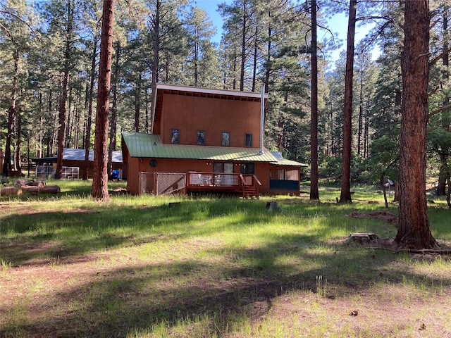 9 Bear Rd, Chama, NM 87520 - view of front of home featuring a metal roof and a wooden deck