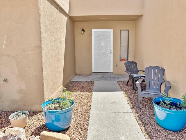 3301 Camino Prado Vis, Santa Fe, NM 87507 - property entrance featuring stucco siding
