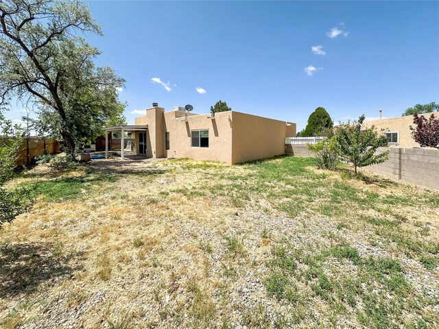 3301 Camino Prado Vis, Santa Fe, NM 87507 - view of fenced backyard