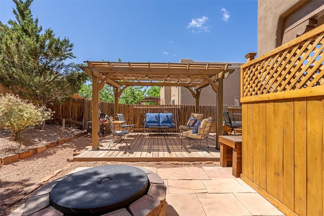 4737 Sundial Way, Santa Fe, NM 87507 - fenced backyard featuring a wooden deck, an outdoor living space, a pergola, and a patio
