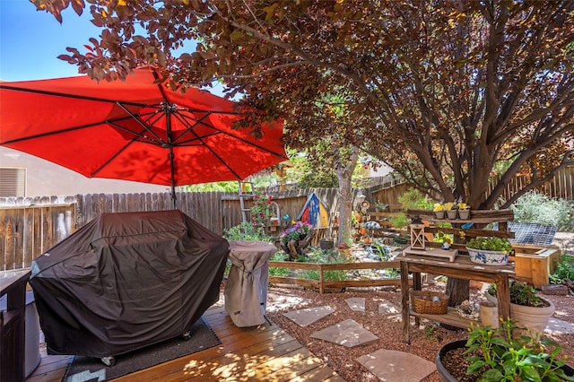 4737 Sundial Way, Santa Fe, NM 87507 - wooden deck with a fenced backyard and a grill