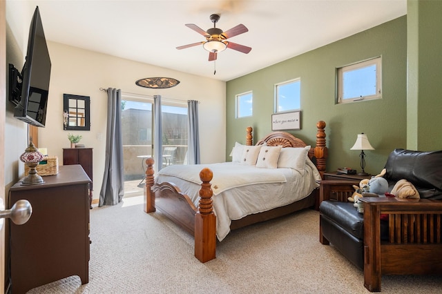 4737 Sundial Way, Santa Fe, NM 87507 - bedroom with access to outside, multiple windows, light colored carpet, and a ceiling fan