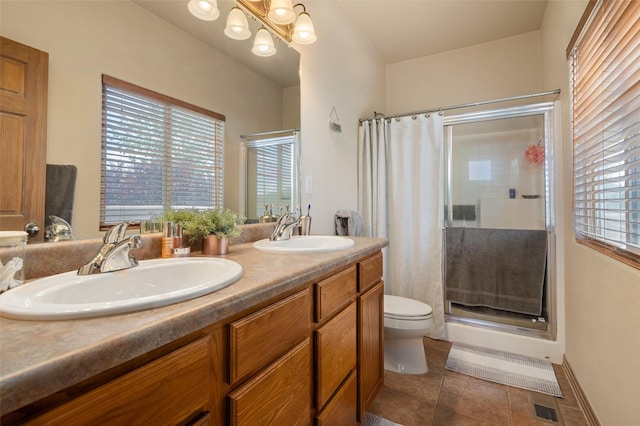 4737 Sundial Way, Santa Fe, NM 87507 - full bathroom featuring a stall shower, tile patterned flooring, double vanity, and a chandelier