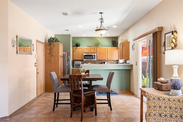 4737 Sundial Way, Santa Fe, NM 87507 - dining area with recessed lighting and light tile patterned flooring