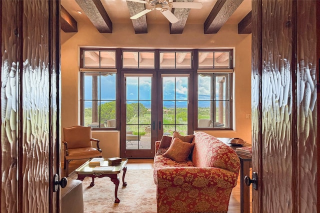 11 E Golden Eagle Rd, Santa Fe, NM 87506 - entryway with beam ceiling, french doors, wood finished floors, and a ceiling fan