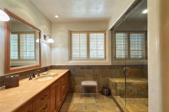 11 E Golden Eagle Rd, Santa Fe, NM 87506 - bathroom with vanity, a stall shower, tile walls, and wainscoting