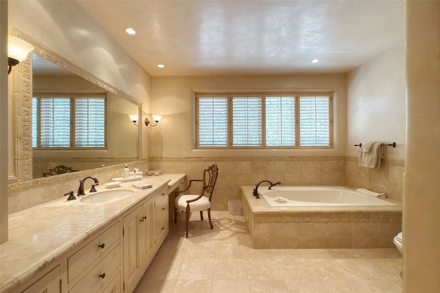11 E Golden Eagle Rd, Santa Fe, NM 87506 - full bathroom with a bath, plenty of natural light, double vanity, tile patterned flooring, and wainscoting