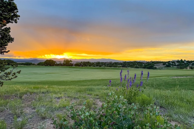 11 E Golden Eagle Rd, Santa Fe, NM 87506 - yard at dusk featuring a mountain view