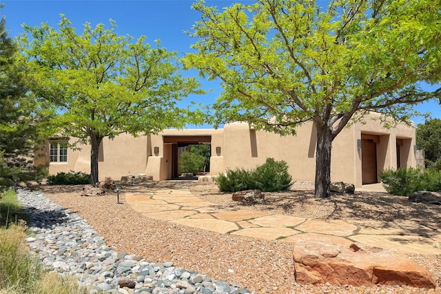 11 E Golden Eagle Rd, Santa Fe, NM 87506 - pueblo-style house with stucco siding