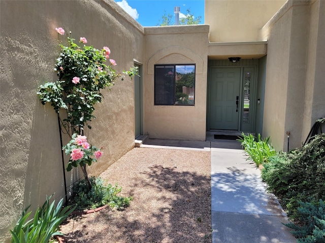 2730 La Silla Dorada, Santa Fe, NM 87505 - doorway to property with stucco siding