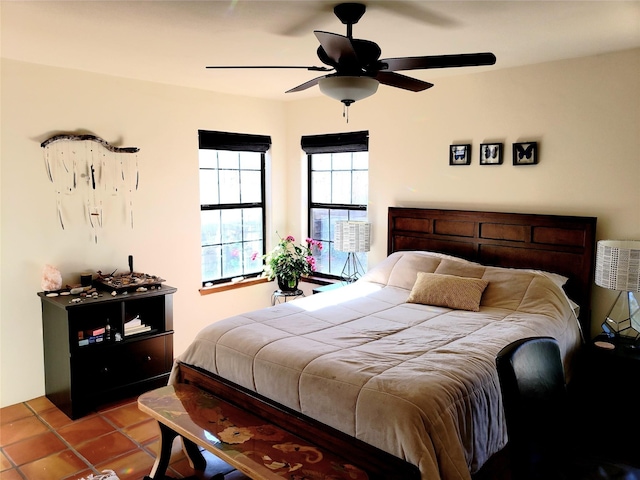 2730 La Silla Dorada, Santa Fe, NM 87505 - bedroom featuring ceiling fan and tile patterned flooring