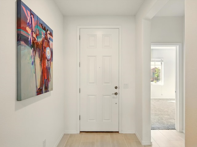 13 Firecrown Ln, Santa Fe, NM 87508 - foyer entrance with baseboards and light tile patterned floors