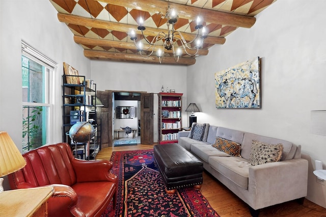 952 Acequia Madre, Santa Fe, NM 87505 - living room featuring beam ceiling, wood finished floors, and a chandelier