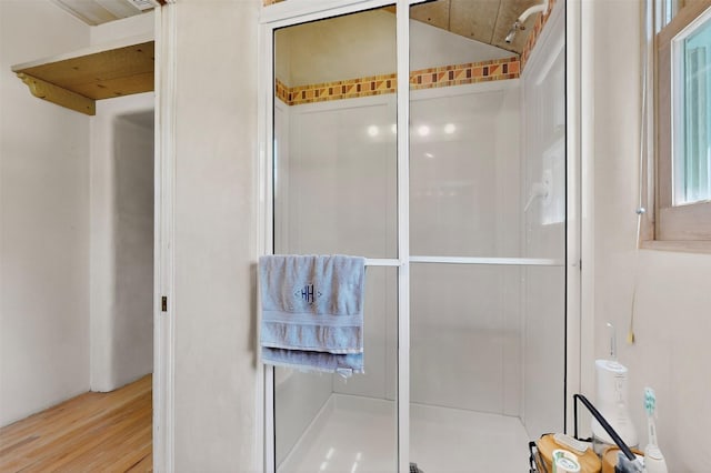 952 Acequia Madre, Santa Fe, NM 87505 - bathroom with a stall shower and wood finished floors