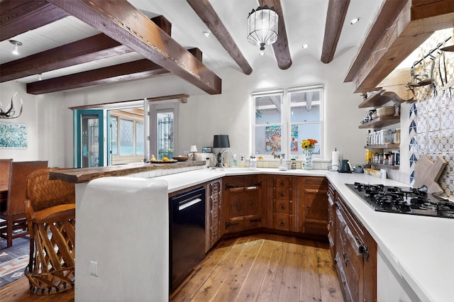 952 Acequia Madre, Santa Fe, NM 87505 - kitchen with black appliances, open shelves, beam ceiling, light wood-style floors, and a peninsula
