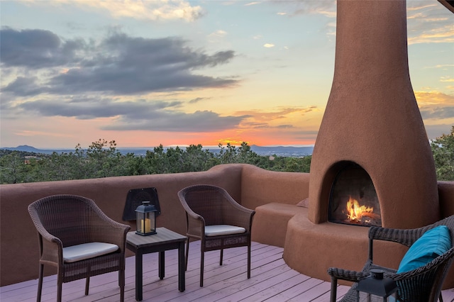 15 Cielo Cumbre Rd, Santa Fe, NM 87505 - wooden terrace featuring a fireplace