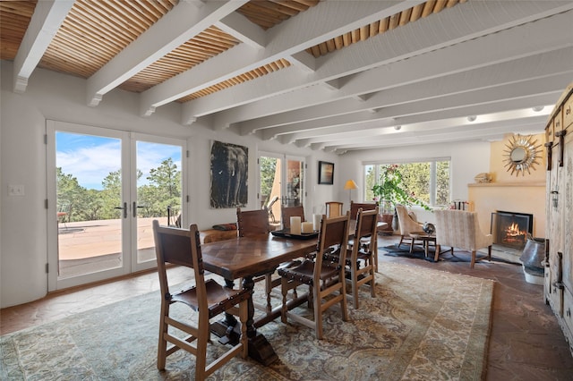 15 Cielo Cumbre Rd, Santa Fe, NM 87505 - dining room with french doors, beam ceiling, and a glass covered fireplace