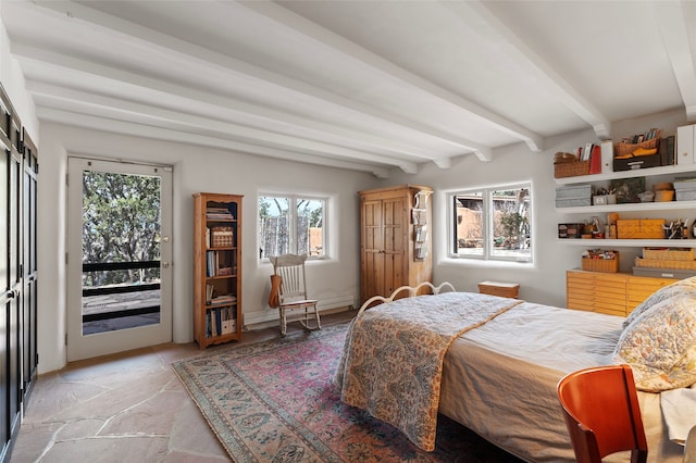 15 Cielo Cumbre Rd, Santa Fe, NM 87505 - bedroom with access to exterior, beamed ceiling, and light stone finish floors