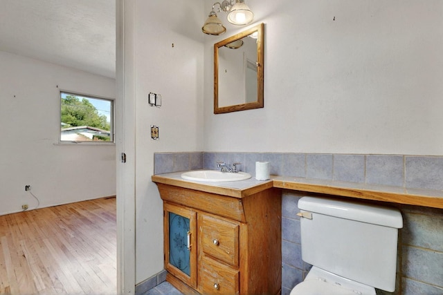 1017 Practilliano Dr, Santa Fe, NM 87505 - bathroom with vanity and wood finished floors
