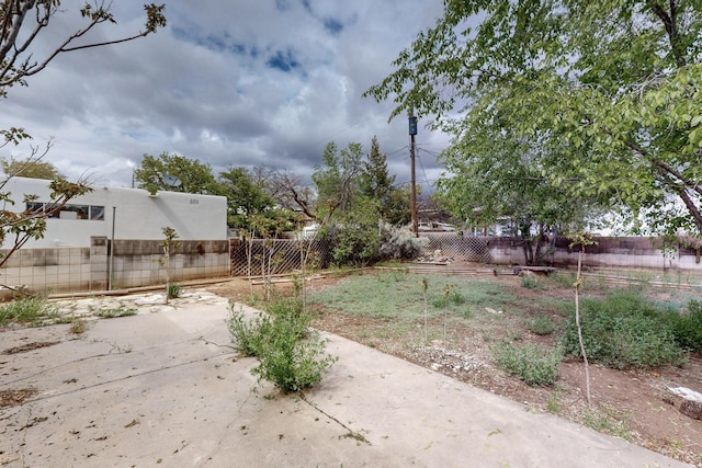 1017 Practilliano Dr, Santa Fe, NM 87505 - fenced yard with a patio