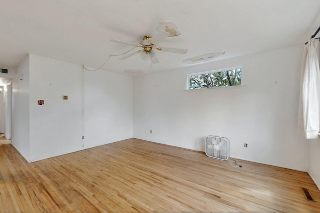 1017 Practilliano Dr, Santa Fe, NM 87505 - unfurnished room with light wood-style flooring and a ceiling fan