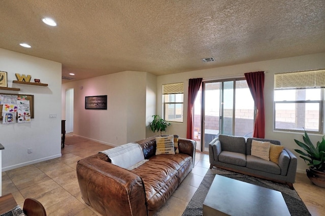139 Rancho Viejo Blvd, Santa Fe, NM 87508 - living area featuring recessed lighting, a textured ceiling, and light tile patterned floors