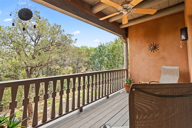 1203 Sierra Del Este, Santa Fe, NM 87501 - wooden terrace with a ceiling fan
