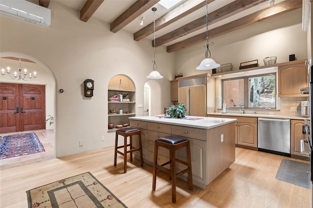 1203 Sierra Del Este, Santa Fe, NM 87501 - kitchen featuring dishwasher, paneled refrigerator, a kitchen island, a wall mounted AC, and light countertops